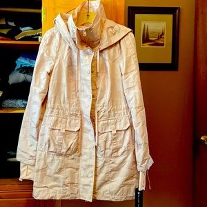 Pink camouflage rain coat.